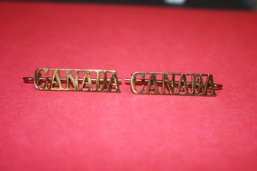 Matching Pair of CANADA Shoulder Brass