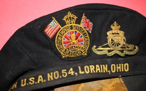 Canadian Legion/US Branch Cap to a member of the RCA